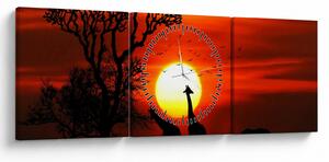 Tablou - Siluete animalelor la apus de soare (cu ceas) (90x30 cm)