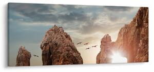 Tablou - Apus de soare peste stânci (120x50 cm)