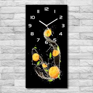 Ceas de sticlă pe perete vertical portocale