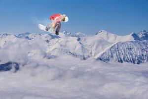 Fototapetă vlies snowboarder zburător pe munți 375 x 250 cm