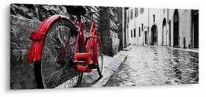 Tablou - Bicicleta roșie pe o stradă pavată (120x50 cm)