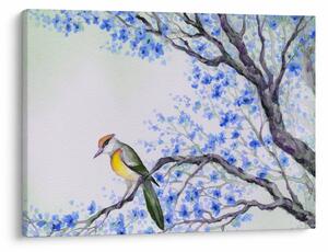 Tablou - Pasăre pe un copac cu flori albastre (70x50 cm)