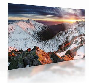 Tablou pe sticlă - Panoramă montană de iarnă (70x50 cm)
