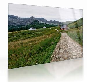 Tablou pe sticlă - Peisaj montan cu case (70x50 cm)