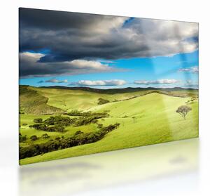 Tablou pe sticlă - Peisaj verde cu dealuri (70x50 cm)