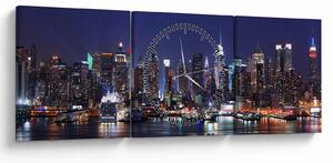 Tablou - Zgârie-nori din New York iluminate (cu ceas) (90x30 cm)