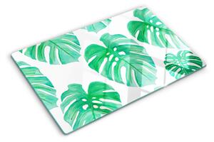 Tocător din sticlă Frunze de Monstera pe fundal alb