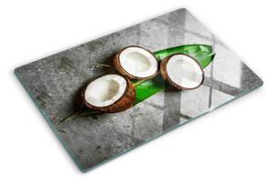 Tocător de bucătărie Nucă de cocos pe un fundal de beton