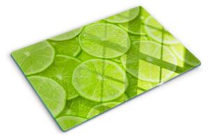 Tocător sticlă Felii de lime pe fundal verde