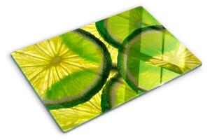 Tocător sticlă Felii de lime pe fundal verde