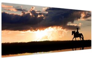 Tablou - Rider pe un cal la apus de soare (120x50 cm)