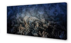 Tablouri canvas Mâinile de lumină albastră