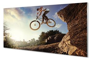 Tablouri pe sticlă Mountain bike nori cer