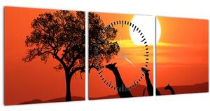 Tablou cu girafe în apus de soare (cu ceas) (90x30 cm)