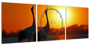 Tablou cu păsări în apus de soare (cu ceas) (90x30 cm)