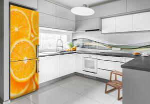 Foto Autocolant pentru piele al frigiderului felii de portocale