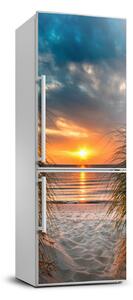 Foto Autocolant pentru piele al frigiderului Apus de soare pe mare