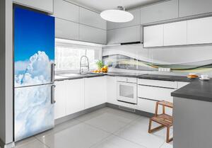 Autocolant pe frigider Zbor deasupra norilor