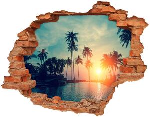 Autocolant un zid spart cu priveliște Apus de soare de palmier