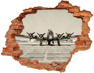 Fototapet un zid spart cu priveliște bombardier vechi