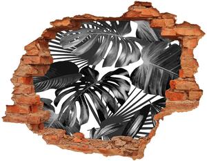 Autocolant un zid spart cu priveliște frunze tropicale