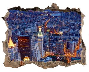 Fototapet un zid spart cu priveliște Manhattan pe timp de noapte