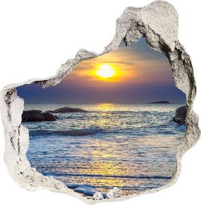 Fototapet un zid spart cu priveliște Apus de soare pe mare