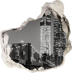 Fototapet un zid spart cu priveliște Manhattan pe timp de noapte