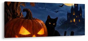 Tablou - Pisică neagră lângă un dovleac luminat de Halloween (120x50 cm)