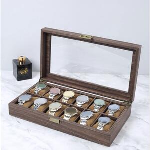 Cutie eleganta pentru depozitare si organizare ceasuri si bijuterii cu 12 compartimente, model Pufo Elite, maro inchis