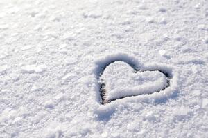 Fotografie de artă Small heart shape on snow with, Vitalii Petrushenko, (40 x 26.7 cm)