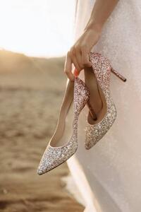 Fotografie de artă Luxurious high-heeled shoes in the bride's, DAMIENPHOTO, (26.7 x 40 cm)