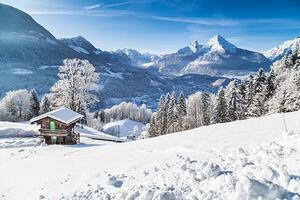 Fotografie de artă Winter wonderland with mountain chalet in the Alps, bluejayphoto, (40 x 26.7 cm)
