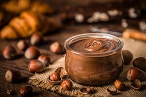 Fotografie de artă Crystal jar full of hazelnut and chocolate spread, carlosgaw, (40 x 26.7 cm)