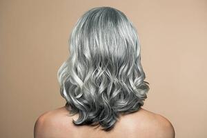 Fotografie Nude mature woman with grey hair, back view., Andreas Kuehn, (40 x 26.7 cm)
