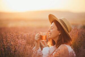 Fotografie de artă Young happy woman drinking herbal tea,, Polina Lebed, (40 x 26.7 cm)