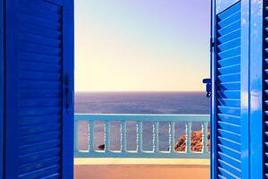 Fotografie Blue Shutters Open onto Sea and Sky at Dawn, Ekspansio, (40 x 26.7 cm)
