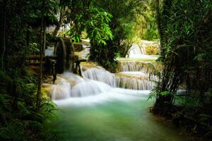 Fotografie Beautiful view of Deep forest waterfall landscape., Chanet Wichajutakul
