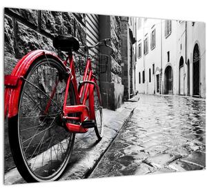 Tablou pe sticlă - Bicicleta roșie pe o stradă pavată (70x50 cm)