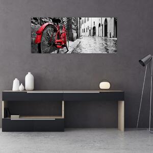 Tablou - Bicicleta roșie pe o stradă pavată (120x50 cm)