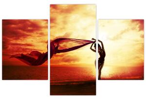 Tablou - Silueta femeii la apus de soare (90x60 cm)