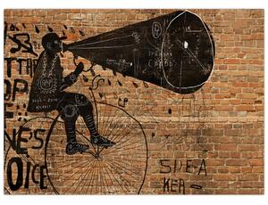 Tablou pe sticlă - Barbat cu biciclete stil Bansky (70x50 cm)