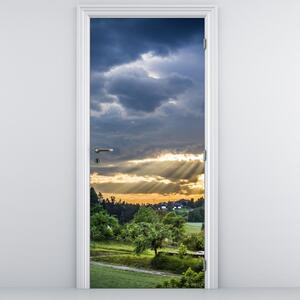 Fototapet pentru ușă - Peisaj cu razele solare (95x205cm)