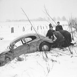 Fotografie A Volkswagen beetle had an accident and was found in the roadside ditch, Germany 1960s