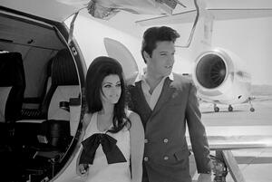 Fotografie Elvis and Priscilla Presley Posing near Airplane, Bettmann