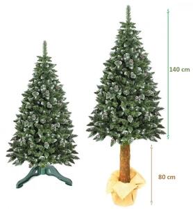 Brad artificial de Craciun, Pine Deluxe 220 cm cu conuri naturale, varfuri albe, tulpina de lemn, suport inclus