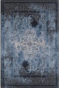 Covor albastru din lână 133x180 cm Difida – Agnella
