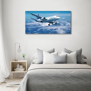 Fotografie imprimată pe sticlă Avionul în nori