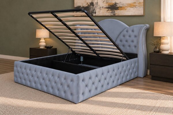 Pat tapițat Chesterfield din catifea Velora Deluxe Classic 140×200 cm, gri deschis, cu ladă de depozitare