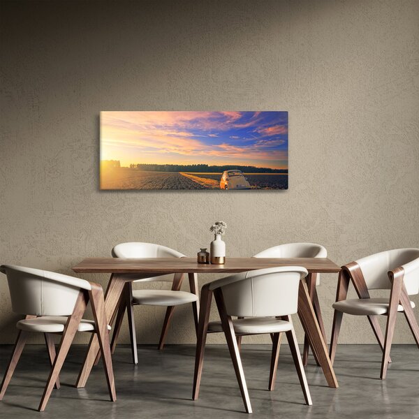 Tablou - Mașină galbenă ăn câmp (120x50 cm)